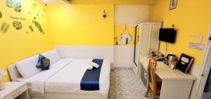 Postel nebo postele na pokoji v ubytování Hai Long Vuong Hotel