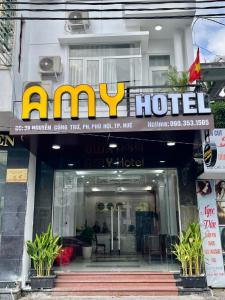 a amley hotel sign on the front of a building at Amy Hotel Hue in Hue