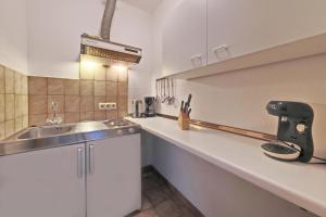 Kuchyň nebo kuchyňský kout v ubytování Hotel Hülsmann Garni