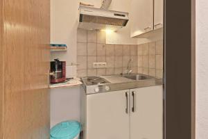 Kuchyň nebo kuchyňský kout v ubytování Hotel Hülsmann Garni
