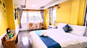Postel nebo postele na pokoji v ubytování Hai Long Vuong Hotel