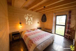 Ένα ή περισσότερα κρεβάτια σε δωμάτιο στο Chalet de la Vallée de Chaudefour
