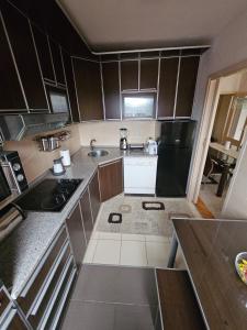 Kuchyň nebo kuchyňský kout v ubytování Apartman Maks 2