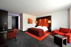 Postel nebo postele na pokoji v ubytování Van der Valk Hotel Hilversum/ De Witte Bergen
