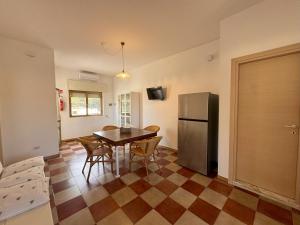 Η κουζίνα ή μικρή κουζίνα στο Villa Odetta - appartamento Ovest