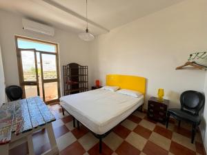 Una cama o camas en una habitación de Villa Odetta - appartamento Est