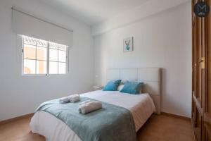 Postel nebo postele na pokoji v ubytování Villa Marquesado