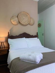 Postel nebo postele na pokoji v ubytování Casa Coco Verde Paraty