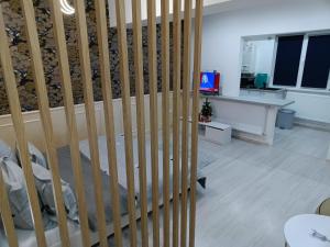 a staircase in a room with a stair case at Lumière Lounge in Craiova