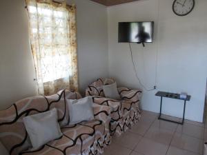 Et tv og/eller underholdning på Cozy two bedroom Villa