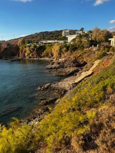 a view of a body of water with a bridge at Thedreamlifehouse in Anavyssos