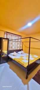 Postel nebo postele na pokoji v ubytování Wander Stay