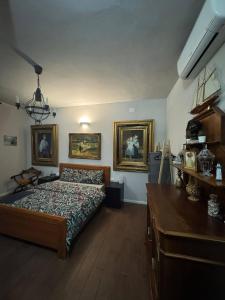 Postel nebo postele na pokoji v ubytování Palazzo Adalgisa