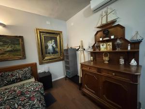 Postel nebo postele na pokoji v ubytování Palazzo Adalgisa