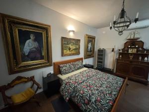 Postel nebo postele na pokoji v ubytování Palazzo Adalgisa