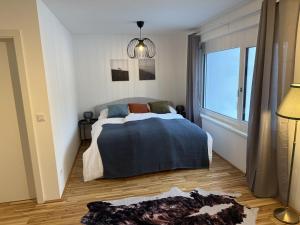 Llit o llits en una habitació de Bergzauber am Semmering