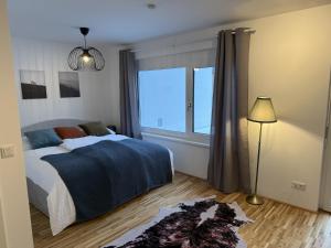 Llit o llits en una habitació de Bergzauber am Semmering
