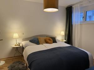 Llit o llits en una habitació de Bergzauber am Semmering