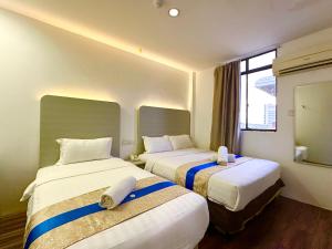 Postel nebo postele na pokoji v ubytování Park Hotel
