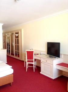 TV a/nebo společenská místnost v ubytování Parkhotel