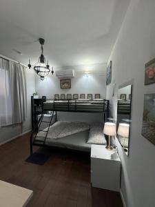 Postel nebo postele na pokoji v ubytování Palazzo Adalgisa