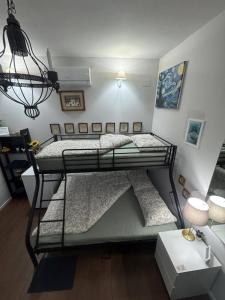 Postel nebo postele na pokoji v ubytování Palazzo Adalgisa