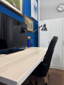 TV a/nebo společenská místnost v ubytování Palazzo Adalgisa