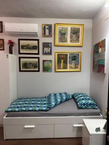Postel nebo postele na pokoji v ubytování Palazzo Adalgisa