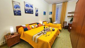 Postel nebo postele na pokoji v ubytování Casa Simpatia Roma Vaticano + 18 fotografií