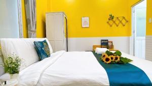 Postel nebo postele na pokoji v ubytování Hai Long Vuong Hotel