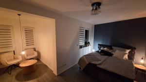 Postel nebo postele na pokoji v ubytování Ferienwohnung Erfurter Seen - Nöda