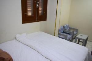 Amoaj hotel فندق امواج客房内的一张或多张床位