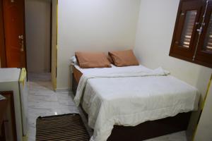 Amoaj hotel فندق امواج客房内的一张或多张床位
