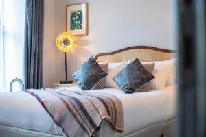 Letto o letti in una camera di Emmet Hotel