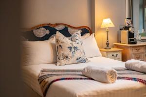 Letto o letti in una camera di Emmet Hotel