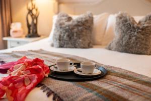 Letto o letti in una camera di Emmet Hotel