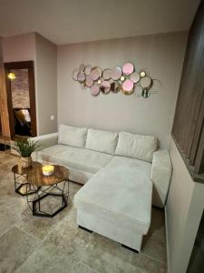 Posezení v ubytování Le boudoir suite&spa