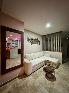 Posezení v ubytování Le boudoir suite&spa