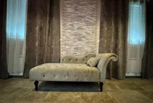 Posezení v ubytování Le boudoir suite&spa