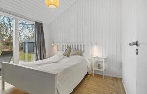 Ένα ή περισσότερα κρεβάτια σε δωμάτιο στο 5 Bedroom Nice Home In Græsted +16 φωτογραφίες