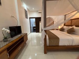 Postel nebo postele na pokoji v ubytování De Luxe Villa Fabian Escape in Seminyak