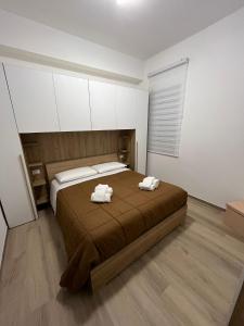 Postel nebo postele na pokoji v ubytování La Perla nel Vico + 42 fotografií