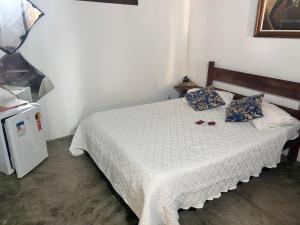 Postel nebo postele na pokoji v ubytování Hospedagem Estalagem Paraty para temporada