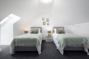 Una cama o camas en una habitación de Almara- Cosy cottage in fife
