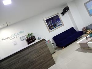 TV a/nebo společenská místnost v ubytování Hotel Suites Caribe + 47 fotografií