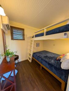 A bed or beds in a room at Waterside Inn