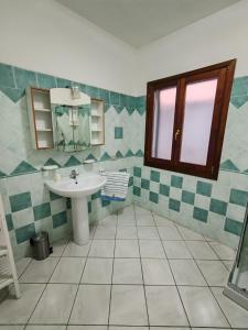 Ένα μπάνιο στο Arya Apartment