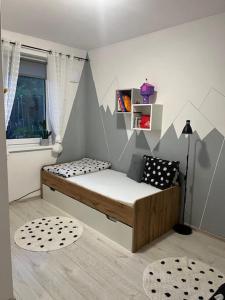 Posteľ alebo postele v izbe v ubytovaní Apartmán Laza