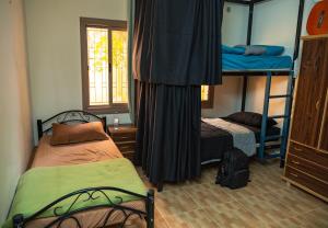 Postel nebo postele na pokoji v ubytování Extra Traveller