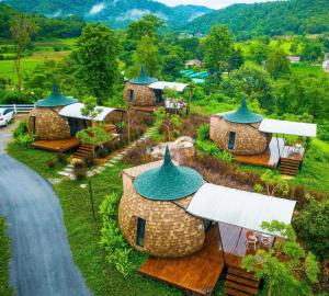 an aerial view of a group of cottages at 2Someplace Resort in Ban Pang Mung